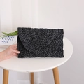 Pochette a busta in paglia intrecciata nera con trama a maglia incrociata per l'estate - Nero