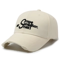 Distressed cream cotton baseball cap with black letter embroidery and worn edge finish - Light Beige