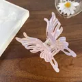 Iridescent pink butterfly hair claw clip with hollow wings and gold spring on dark wood - Large Butterfly 9cm / Iridescent Purple