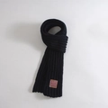 Navy blue knitted scarf for kids featuring a soft texture and brown leather patch accent - ESTS MOVE Leather Label / Black