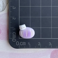 Mini resin cat bead showing 2cm dimensions on a centimeter scale cutting mat - Purple Cat Bread