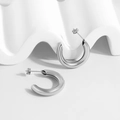 Minimalist silver C-shaped hollow hoop earrings with a polished metallic finish - Silver C-Shape