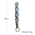 Handmade crochet daisy keychain charm in light blue with gold ring, 18cm 20g length - Blue Green & White