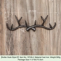Vintage cast iron antler wall hook on rustic wood background with industrial aesthetic - Antler Hook Style E 15749-4