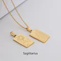Macro shot of gold Sagittarius tarot pendant with intricate engravings on stainless steel - Sagittarius