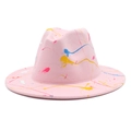 Detailed view of pink wool fedora hat featuring colorful artistic paint splatter patterns - M (56-58cm) / Pink