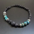 Detail of natural turquoise and black lava rock beaded bracelet with silver spacers - Lava Stone & Turquoise