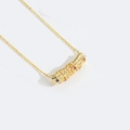 Golden necklace with a cylindrical pendant featuring colorful inset gemstones on white - Geometric Cylinder