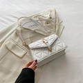 Elegant white quilted crossbody bag with golden horseshoe buckle and top handle - White