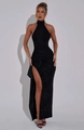 Detailed view of the side slit and shimmering fabric on this black backless maxi dress - S / Black