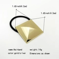 Detail view of a 14g gold pyramid alloy hair tie with measurement 1.65 inch size - 3D Pyramid Square / Gold