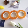 Three rolls of orange floral crepe paper tape for DIY flower arrangement crafts - 16 Orange