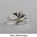 Minimalist adjustable silver ring with unique wing and arrow design for a modern look - Angel Wing Ring