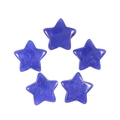 Detailed view of five blue star-shaped natural semi-precious stone ornaments on white - Dyed Lapis Lazuli