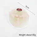 Mini roze octopus slijm speelgoed in groene gel met kerstlabel, diameter van 9cm - Octopus