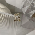 Macro detail of gold T-shape earrings with mother of pearl and sparkling zircon inlay - Adjustable Open / T-Shaped Mother of Pearl Rhinestone Style (J2768)