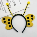 Detail von Bienen-Stirnband mit gelben Fühlern und goldenen Glitzerflügeln für Partys - Gelber Bienen-Stil