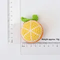Handmade crochet orange slice keychain with dimensions and 10g weight details - Combed Cotton Knitted Orange