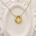 Golden puffy oval pendant necklace with polished mirror finish and beaded snake chain - Gold Letter O