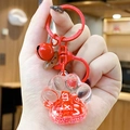Red cat paw liquid quicksand keychain with metal hook and small coffee bean charm - Red Cat Paw Letter Beads
