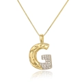 Macro detail of gold letter G pendant with cubic zirconia inlay on a box chain - Letter G