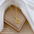 Detail of clover pendant with diamond accents, size 2.2x1.5cm and 3.1g weight - Gold Stainless Steel Chain Copper Micro-pave Pendant / Gold