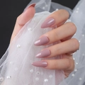 Glossy mauve almond press-on nails shown against elegant pearl tulle background - Glossy Lotus Pink (JJL-10)