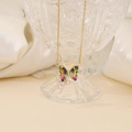Elegant gold chain necklace featuring a gradient colorful butterfly pendant with small diamonds - Rainbow