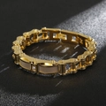 Macro view of men's gold stainless steel motorcycle chain bracelet with mesh detail and diamond - Gold (KB117622-KHY)