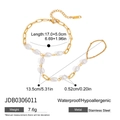 Detailansicht von Edelstahl-Sklavenarmband mit weißen Perlen und goldener Gliederkette - Gold (JDB0306011)