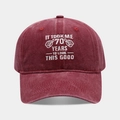 Detailed close-up of premium embroidered lettering on a vintage washed burgundy baseball cap - 70th Birthday Style - Wine Red
