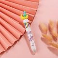 White multi-color ballpoint pen with a cartoon unicorn on yellow moon silicone topper - Moon Unicorn - White
