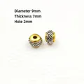 Gold-silberne Fassperle mit 9mm Durchmesser und geschnitzten Wirbeltexturen - 9mm Trommelperle / B-1 Gold Trommelperle