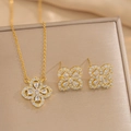 Gold flower jewelry set with white zircon necklace and stud earrings on silk background - Gold Set (557)