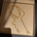 Elegant gold woven lariat necklace with multi-strand fringe tassels in jewelry box - Mesh Woven Tassel Style / Gold