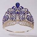 Macro shot of gold wedding crown with luxury blue teardrop crystals and sparkling rhinestones - Gold/Blue Zirconia