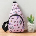 Detail view of pink unicorn chest bag with adjustable strap on a wooden display - Pink Unicorn