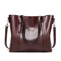 Deep burgundy glossy leather tote bag with dual handles and detachable shoulder strap - Coffee
