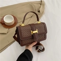 Dark brown woven crossbody bag with gold H-buckle and wide shoulder strap - Coffee