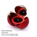Red spherical jewelry flower box with golden bow and black velvet ring insert - Gold Buckle Sphere Rose Ring Box / Red