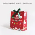 Sac cadeau de Noël rouge avec imprimés flocons et ruban en satin vert forêt - Moyen (24.5x22x10cm) / Rouge