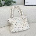 Quilted beige tote bag with cute cartoon animal prints and a small blue label - Puppy Bear