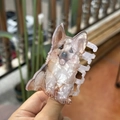 Detail of cute acrylic dog hair claw clip with pearlescent finish and brown ear details - Loyal German Shepherd
