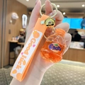 Schlüsselanhänger mit orangefarbener Limonade, Flüssigsand und Silikon-Handgelenkschlaufe - Orangefarbene Limonadenflasche