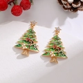 Macro shot of festive Christmas tree earrings with colorful rhinestones and red bows - 26 KC Gold 8949
