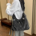 Large black hobo shoulder bag with glossy pleated texture and silver butterfly details - Black (Without Charm)