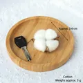 Natural dried cotton flower head 5-6cm for DIY Christmas decor on white snow background - White Cotton Bolls