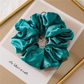 Elegant large satin scrunchie in deep teal green with a glossy finish and elastic band - Green