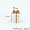 Mini kerstcadeau van witte hars met gouden strik en afmetingen voor DIY-decoratieaccessoire - Nr. 1 Witgouden Cadeauverpakking
