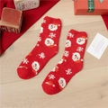 Festive red coral fleece Christmas socks featuring Santa Claus and snowflake patterns - Snowman Head